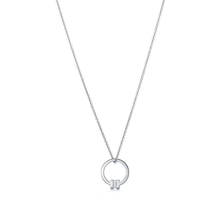 Tiffany T Pendant with a Baguette Diamond on a 18" Chain