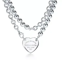 Return to Tiffany™ Heart Tag Wrap Necklace in Sterling Silver, 32" long.