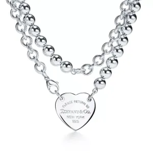 Return to Tiffany™ Heart Tag Wrap Necklace in Sterling Silver, 32" long.